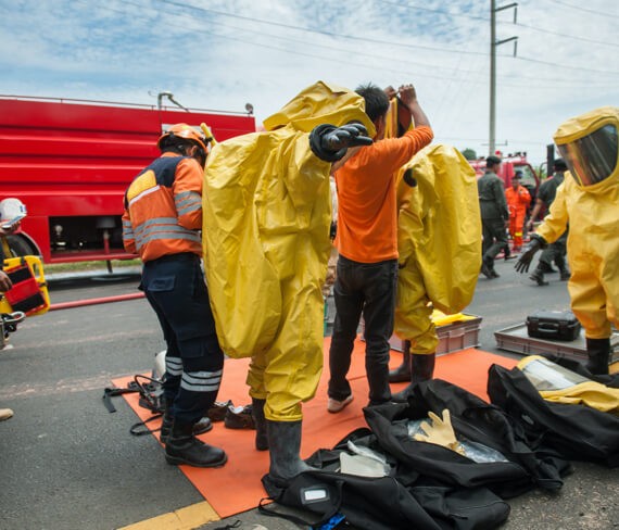 First Response Cleaning's crew puts on their personal protective equipment before performing a drug lab cleanup