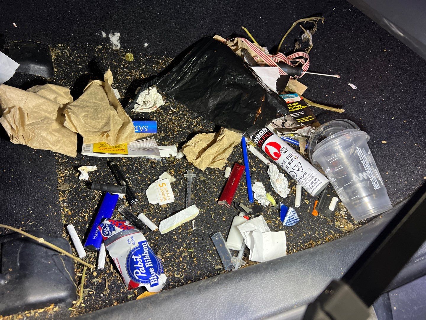 drug parphanalia on car floor