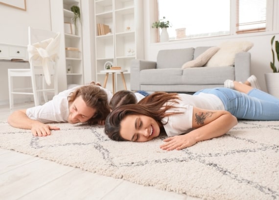 couple on floor happy